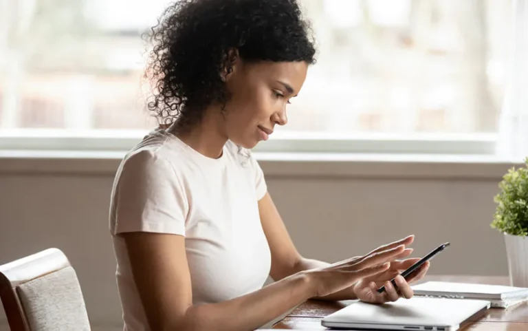 woman check loan on her phone